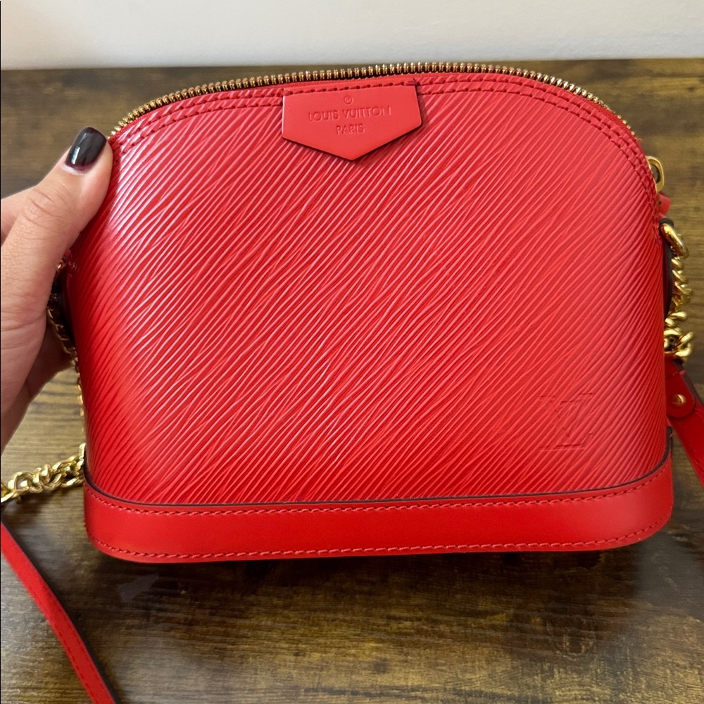 Louis Vuitton ALMA MINI Red Interior